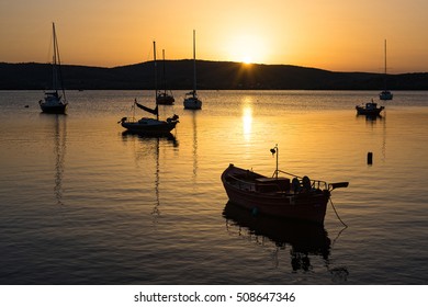 Various Boats At Sunset In Pagasetic Gulf, Greece