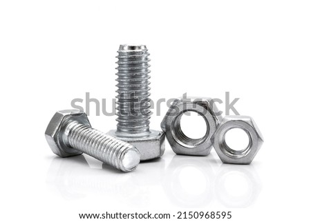 Various bolts and nuts on white background