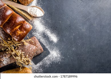 Various bread set. Many different wheat, grain and rye bread with ears of rye and wheat, flour and baker's tools on a white wooden background - Shutterstock ID 1787189996