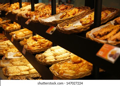 Various bread type on shelf in Bakery shop. - Shutterstock ID 147027224