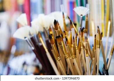 Various brushes shelf in art shop