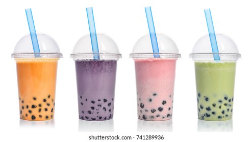 Various Bubble Tea in a plastic cups with drink straws isolated on white background. Take away drinks concept.