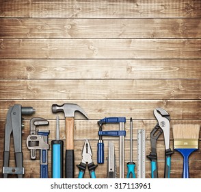 Various Carpentry, Repairing, DIY Tools On Wooden Background