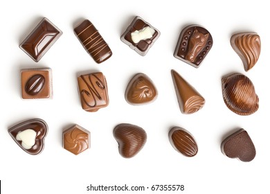 Various Chocolate Pralines Isolated On White Background