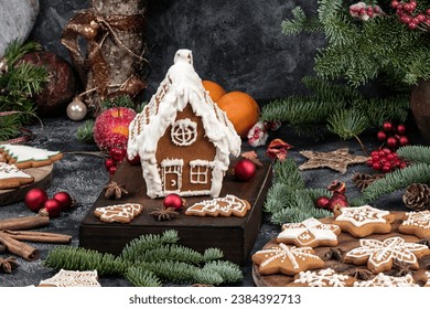 Various christmas gingerbread cookies on dark table with flour - Powered by Shutterstock