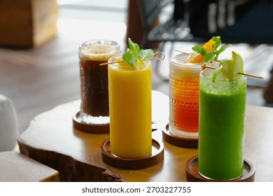 Various of cold drinks on the table. Beverage menu, summer drink. Juice, peach iced tea and cold coffee.