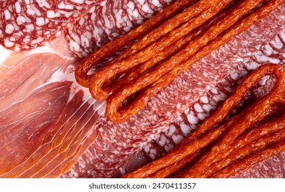 Various cold meat appetizers - Spanish ham cerrato, salami, sausages - Powered by Shutterstock