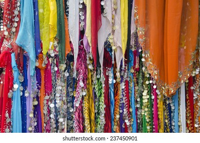 Various Colorful Ornate Indian Silk Shawl In Street Market