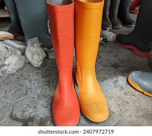 various colors of safety boots made from rubber and water proff - Powered by Shutterstock