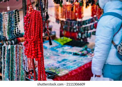 A Lot Of Various Colourful Beads In Different Colours Are Selling On The Outdoor. Traditional Handmade Jewellery. Red. City. Market. Trade. Trading. Necklaces. Street