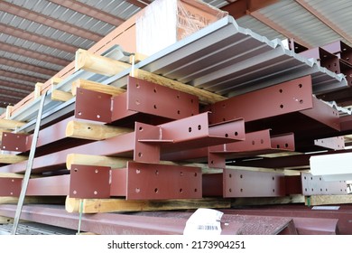 Various Components Such As Columns, Rafters, Purlins, Girts, And Panels For Steel Erection Of Metal Building.