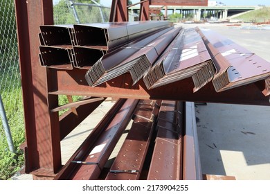 Various Components Such As Columns, Rafters, Purlins, Girts, And Panels For Steel Erection Of Metal Building.