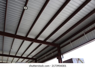 Various Components Such As Columns, Rafters, Purlins, Girts, And Panels For Steel Erection Of Metal Building.