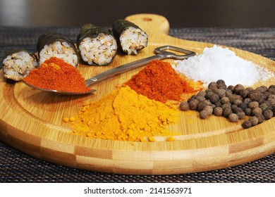 Various Condiments With Cut Stuffed Cabbage 