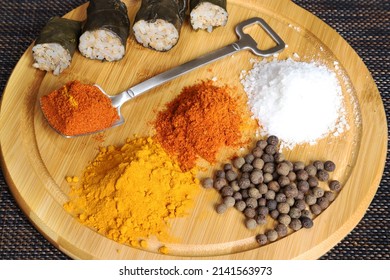 Various Condiments With Cut Stuffed Cabbage 