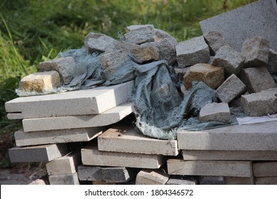 Various Construction Materials Piled In A Construction Pile.