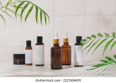 Various cosmetic bottles for moisturizing serum, cream and lotion. Natural cosmetics for skin care concept - Shutterstock ID 2127604439