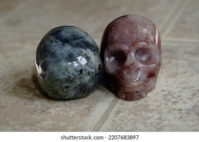                               Various Crystal Skulls On Background.