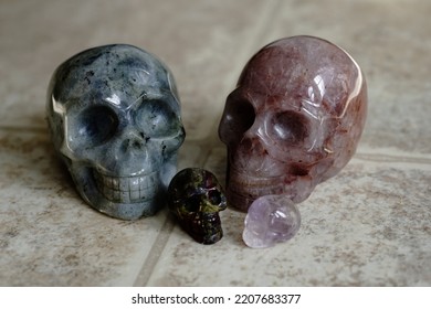                                Various Crystal Skulls On Linoleum.