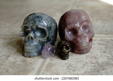                                Various Crystal Skulls On Linoleum.