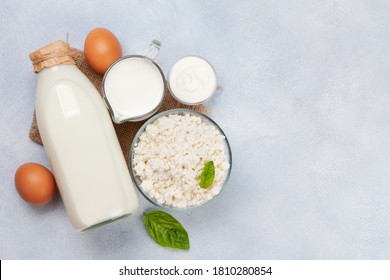 Various Dairy Products. Milk, Cheese, Cottage, Sour Cream. Top View Flat Lay With Copy Space