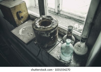 various devices and microscopes, ionometry measuring tubes, in an abandoned vintage lab