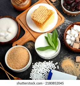 Various diet replacement for sugar on dark background. Organic sweetener concept. Top view, flat lay