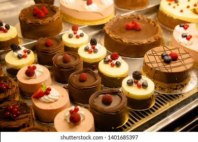 Various Different Types Of Sweet Cakes In Pastry Shop