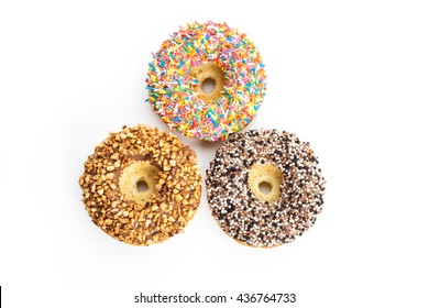 various donuts on white background