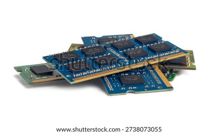 Various DRAM memory modules are displayed, highlighting types like DIMM and SODIMM amid a shortage in the tech market.