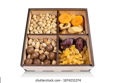 Various Dried Fruits In A Box Isolated On White Background. Close-up