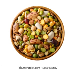 Various dried legumes: lentils bean pea chickpea in a wooden cup top view isolated on white.