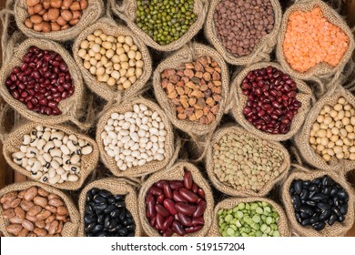 Various dry legumes in a sack cloth, Different dry legumes for background - Shutterstock ID 519157204