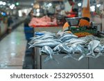 various fish from the sea and rivers sold by traders in traditional markets