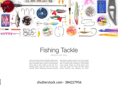 various fishing tackle on white background with copy space top view
