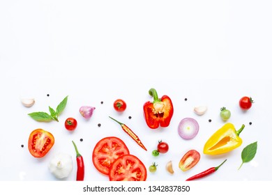 Various fresh vegetables and herbs on white background. Cooking ingredients, Healthy eating concept