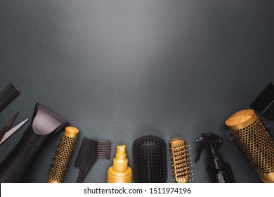 Various Hair Dresser And Cut Tools On Black Background With Copy Space