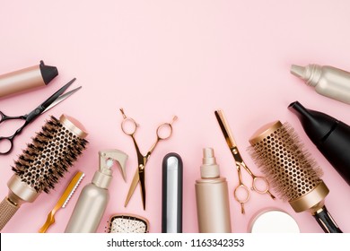 Various hair dresser tools on pink background with copy space - Shutterstock ID 1163342353