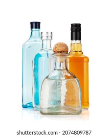 Various Hard Liquor Bottles. Gin, Vodka, Tequila And Whiskey. Isolated On White Background