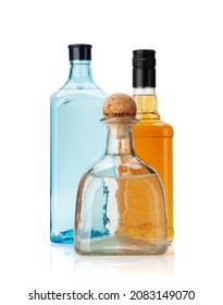 Various Hard Liquor Bottles. Gin, Vodka, Tequila And Whiskey. Isolated On White Background