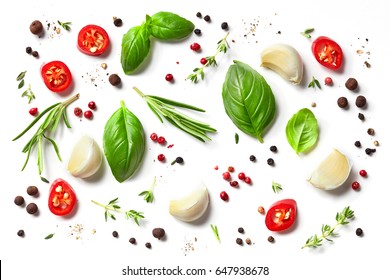 various herbs and spices isolated on white background, top view - Shutterstock ID 647938678