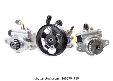 various hydraulic power steering pumps on a white background engine parts