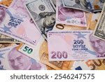 Various international currency notes including Turkish lira, US dollars, and Euros. Concept of global financial systems and currency exchange. 