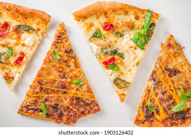 Various Italian American Traditional Pizza Slices. Slices Of Delicious Pizza On Light Background, Top View Flatlay