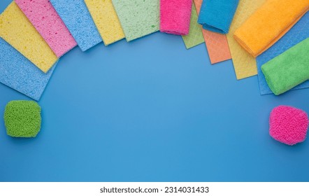 Various items for cleaning. Microfiber cloths, washcloths, scrapers, sponges - Powered by Shutterstock