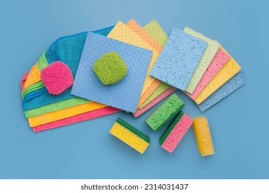 Various items for cleaning. Microfiber cloths, washcloths, scrapers, sponges - Powered by Shutterstock