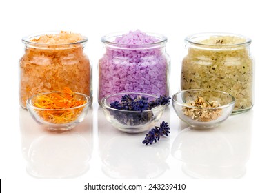 Various Kinds Of Bath Salt With Flowers, Isolated On White Background