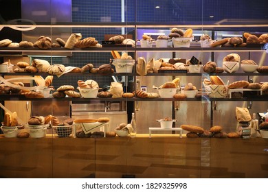 various kinds of bread on display in bakeries - Shutterstock ID 1829325998