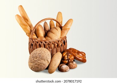 Various kinds of bread stuff. Bread rolls, baguette, sweet bun, croissant and bagel.