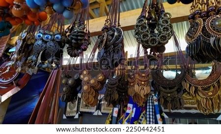 Various kinds of necklaces as souvenirs typical of Jogja which are for sale along Malioboro Street. Traditional handmade necklace. Colorful handmade necklace